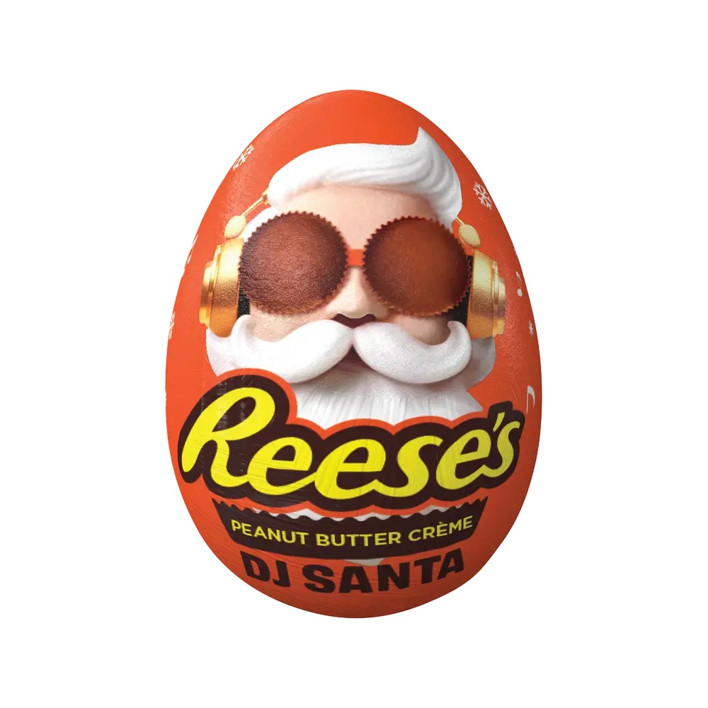 Piena šokolādes ola REESE'S DJ SANTA EGG (PEANUT BUTTER CREME) 34g foto